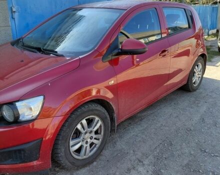Красный Шевроле Авео, объемом двигателя 1.2 л и пробегом 165 тыс. км за 4000 $, фото 1 на Automoto.ua