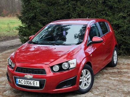 Червоний Шевроле Авео, об'ємом двигуна 1.3 л та пробігом 250 тис. км за 5999 $, фото 1 на Automoto.ua