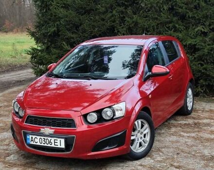 Красный Шевроле Авео, объемом двигателя 1.3 л и пробегом 250 тыс. км за 5999 $, фото 1 на Automoto.ua