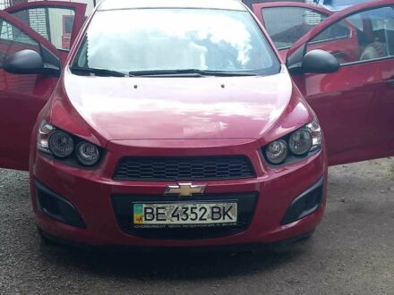 Красный Шевроле Авео, объемом двигателя 1.4 л и пробегом 18 тыс. км за 9000 $, фото 1 на Automoto.ua