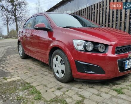 Красный Шевроле Авео, объемом двигателя 1.4 л и пробегом 83 тыс. км за 6600 $, фото 1 на Automoto.ua