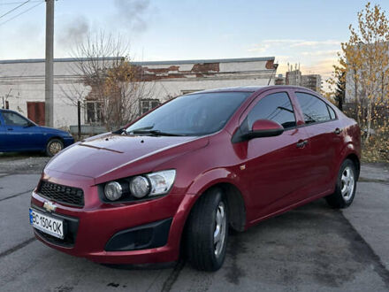 Красный Шевроле Авео, объемом двигателя 1.4 л и пробегом 116 тыс. км за 5500 $, фото 1 на Automoto.ua