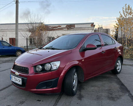 Червоний Шевроле Авео, об'ємом двигуна 1.4 л та пробігом 116 тис. км за 5500 $, фото 1 на Automoto.ua