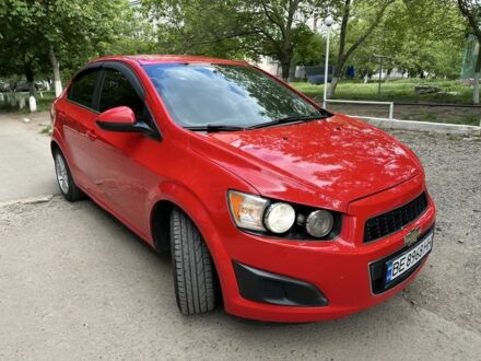 Шевроле Авео 2014 у Первомайськ на Automoto.ua Червоний Шевроле Авео, об'ємом двигуна 1.8 л та пробігом 153 тис. км за 7800 $, фото 1 на Automoto.ua