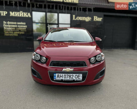 Красный Шевроле Авео, объемом двигателя 1.4 л и пробегом 50 тыс. км за 6350 $, фото 1 на Automoto.ua