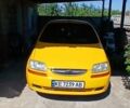 Желтый Шевроле Авео, объемом двигателя 1.5 л и пробегом 184 тыс. км за 3150 $, фото 1 на Automoto.ua