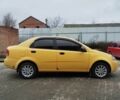 Желтый Шевроле Авео, объемом двигателя 1.5 л и пробегом 212 тыс. км за 2100 $, фото 5 на Automoto.ua