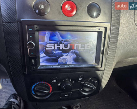 Жовтий Шевроле Авео, об'ємом двигуна 1.5 л та пробігом 179 тис. км за 1250 $, фото 18 на Automoto.ua