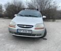 Серый Шевроле Авео, объемом двигателя 1.5 л и пробегом 297 тыс. км за 2000 $, фото 1 на Automoto.ua