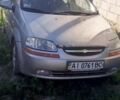 Серый Шевроле Авео, объемом двигателя 1.5 л и пробегом 295 тыс. км за 895 $, фото 1 на Automoto.ua