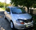 Серый Шевроле Авео, объемом двигателя 1.5 л и пробегом 250 тыс. км за 2650 $, фото 1 на Automoto.ua