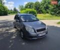 Серый Шевроле Авео, объемом двигателя 1.5 л и пробегом 199 тыс. км за 3899 $, фото 1 на Automoto.ua