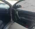 Сірий Шевроле Авео, об'ємом двигуна 1.5 л та пробігом 243 тис. км за 3700 $, фото 1 на Automoto.ua