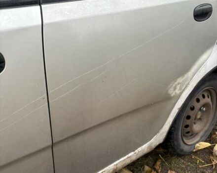 Серый Шевроле Авео, объемом двигателя 1.4 л и пробегом 270 тыс. км за 2000 $, фото 2 на Automoto.ua