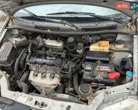 Серый Шевроле Авео, объемом двигателя 1.4 л и пробегом 270 тыс. км за 2000 $, фото 1 на Automoto.ua