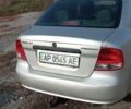 Серый Шевроле Авео, объемом двигателя 1.5 л и пробегом 310 тыс. км за 2000 $, фото 1 на Automoto.ua