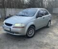 Серый Шевроле Авео, объемом двигателя 1.5 л и пробегом 220 тыс. км за 1999 $, фото 1 на Automoto.ua