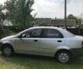 Серый Шевроле Авео, объемом двигателя 1.5 л и пробегом 221 тыс. км за 3500 $, фото 1 на Automoto.ua
