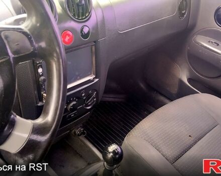 Серый Шевроле Авео, объемом двигателя 1.5 л и пробегом 225 тыс. км за 1650 $, фото 5 на Automoto.ua