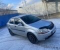 Серый Шевроле Авео, объемом двигателя 1.4 л и пробегом 200 тыс. км за 1499 $, фото 1 на Automoto.ua
