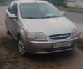 Серый Шевроле Авео, объемом двигателя 1.5 л и пробегом 260 тыс. км за 2500 $, фото 1 на Automoto.ua