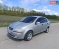 Серый Шевроле Авео, объемом двигателя 1.5 л и пробегом 245 тыс. км за 2495 $, фото 1 на Automoto.ua
