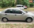 Серый Шевроле Авео, объемом двигателя 1.5 л и пробегом 310 тыс. км за 2400 $, фото 1 на Automoto.ua
