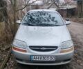 Серый Шевроле Авео, объемом двигателя 1.5 л и пробегом 243 тыс. км за 2000 $, фото 1 на Automoto.ua