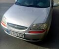 Серый Шевроле Авео, объемом двигателя 1.5 л и пробегом 420 тыс. км за 2000 $, фото 1 на Automoto.ua