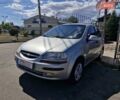 Серый Шевроле Авео, объемом двигателя 1.5 л и пробегом 277 тыс. км за 2799 $, фото 2 на Automoto.ua