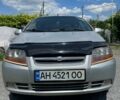 Сірий Шевроле Авео, об'ємом двигуна 1.5 л та пробігом 243 тис. км за 2500 $, фото 1 на Automoto.ua