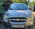 Серый Шевроле Авео, объемом двигателя 1.5 л и пробегом 245 тыс. км за 3900 $, фото 1 на Automoto.ua