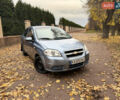 Серый Шевроле Авео, объемом двигателя 1.5 л и пробегом 253 тыс. км за 2900 $, фото 1 на Automoto.ua