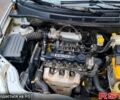 Серый Шевроле Авео, объемом двигателя 1.5 л и пробегом 210 тыс. км за 3350 $, фото 2 на Automoto.ua