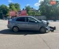 Серый Шевроле Авео, объемом двигателя 1.5 л и пробегом 208 тыс. км за 2000 $, фото 2 на Automoto.ua