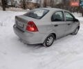 Серый Шевроле Авео, объемом двигателя 1.5 л и пробегом 295 тыс. км за 2399 $, фото 1 на Automoto.ua