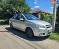 Серый Шевроле Авео, объемом двигателя 1.6 л и пробегом 128 тыс. км за 4500 $, фото 1 на Automoto.ua