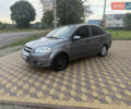 Серый Шевроле Авео, объемом двигателя 1.5 л и пробегом 320 тыс. км за 2300 $, фото 1 на Automoto.ua