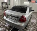 Серый Шевроле Авео, объемом двигателя 1.6 л и пробегом 240 тыс. км за 3100 $, фото 3 на Automoto.ua