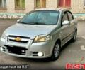 Серый Шевроле Авео, объемом двигателя 1.6 л и пробегом 260 тыс. км за 3800 $, фото 1 на Automoto.ua