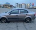 Серый Шевроле Авео, объемом двигателя 1.5 л и пробегом 236 тыс. км за 2900 $, фото 1 на Automoto.ua