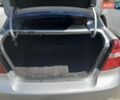 Серый Шевроле Авео, объемом двигателя 1.6 л и пробегом 259 тыс. км за 4000 $, фото 1 на Automoto.ua