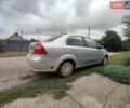 Серый Шевроле Авео, объемом двигателя 1.6 л и пробегом 253 тыс. км за 4000 $, фото 1 на Automoto.ua