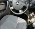 Серый Шевроле Авео, объемом двигателя 1.6 л и пробегом 106 тыс. км за 3850 $, фото 3 на Automoto.ua
