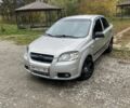 Серый Шевроле Авео, объемом двигателя 1.5 л и пробегом 235 тыс. км за 3900 $, фото 1 на Automoto.ua