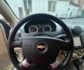Сірий Шевроле Авео, об'ємом двигуна 1.6 л та пробігом 353 тис. км за 4000 $, фото 11 на Automoto.ua