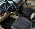 Серый Шевроле Авео, объемом двигателя 1.6 л и пробегом 106 тыс. км за 2800 $, фото 1 на Automoto.ua