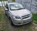 Серый Шевроле Авео, объемом двигателя 1.6 л и пробегом 205 тыс. км за 3200 $, фото 1 на Automoto.ua