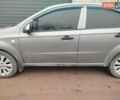Серый Шевроле Авео, объемом двигателя 1.5 л и пробегом 220 тыс. км за 3300 $, фото 4 на Automoto.ua