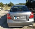 Серый Шевроле Авео, объемом двигателя 1.5 л и пробегом 170 тыс. км за 2800 $, фото 1 на Automoto.ua